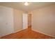 A bright bedroom features hardwood flooring and a closet at 8750 Rutgers St, Westminster, CO 80031