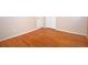 A bright bedroom features hardwood flooring and a closet at 8750 Rutgers St, Westminster, CO 80031