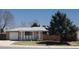 Charming single-story home featuring a well-maintained front yard and an attached garage at 8750 Rutgers St, Westminster, CO 80031