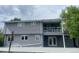 Exterior view of home with a deck or balcony, and neutral siding at 1158 E Easter Ct, Centennial, CO 80122