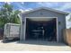 Spacious garage interior featuring boat and trailer, providing ample storage at 1158 E Easter Ct, Centennial, CO 80122