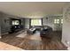 Comfortable living room with a sectional sofa, large TV, and modern decor at 1158 E Easter Ct, Centennial, CO 80122