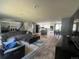 Spacious living room with modern decor, an open layout, and plenty of natural light at 1158 E Easter Ct, Centennial, CO 80122