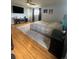 Cozy main bedroom with hardwood floors, a ceiling fan, and neutral tones at 1158 E Easter Ct, Centennial, CO 80122