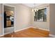 Inviting dining area with gleaming hardwood floors and bright windows to enjoy the view at 3960 Cody St, Wheat Ridge, CO 80033
