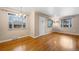Bright living space featuring hardwood floors, lots of windows, and classic decor at 3960 Cody St, Wheat Ridge, CO 80033