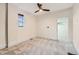 Empty bedroom featuring a window for natural light and walk-in closet at 3726 N High St, Denver, CO 80205