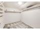 A spacious walk-in closet has ample shelving and storage for an organized wardrobe at 3726 N High St, Denver, CO 80205