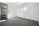 Bright bedroom with a window and view to another room at 6663 Zinnia St, Arvada, CO 80004