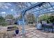 Backyard deck featuring a pergola, shed, and gardening area, perfect for outdoor relaxation and activities at 7761 S Wellington St, Centennial, CO 80122