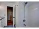 Bathroom featuring white subway tile shower and updated fixtures at 7761 S Wellington St, Centennial, CO 80122