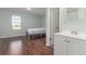 Bedroom adjacent to bathroom with vanity at 1622 S Idalia Cir # E, Aurora, CO 80017