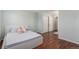 Bedroom with wood floors, closet, and comfortable full bed at 1622 S Idalia Cir # E, Aurora, CO 80017