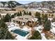 Luxury home with pool and expansive mountain views at 10029 Whistling Elk Dr, Littleton, CO 80127