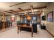 Large basement rec room with wet bar and fireplace at 10029 Whistling Elk Dr, Littleton, CO 80127