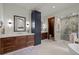 Luxurious bathroom with double vanity and large shower at 10029 Whistling Elk Dr, Littleton, CO 80127