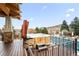 Hot tub on deck overlooking the pool and mountain views at 10029 Whistling Elk Dr, Littleton, CO 80127