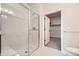 Bathroom with glass-enclosed shower and access to walk-in closet at 834 W 128Th Pl, Westminster, CO 80234