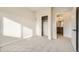 Neutral bedroom showcasing a closet and bathroom access creating a serene and functional space at 834 W 128Th Pl, Westminster, CO 80234