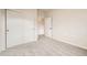 Spacious carpeted bedroom with neutral walls and double sliding door closet at 834 W 128Th Pl, Westminster, CO 80234