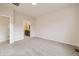 Spacious carpeted bedroom with neutral walls and attached bathroom at 834 W 128Th Pl, Westminster, CO 80234