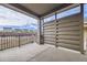 Covered patio with open views and fencing and brick detail, perfect for outdoor relaxation and entertainment at 834 W 128Th Pl, Westminster, CO 80234