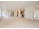 Expansive living area with an open floor plan seamlessly integrating the kitchen, perfect for modern living at 834 W 128Th Pl, Westminster, CO 80234