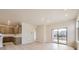 Open-concept layout seamlessly integrates the kitchen and living area, enhancing flow and connectivity at 834 W 128Th Pl, Westminster, CO 80234