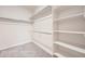 Spacious walk-in closet with shelving and hanging rods, offering ample storage at 834 W 128Th Pl, Westminster, CO 80234