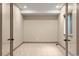 A bright bedroom with neutral walls and carpeting, illuminated by recessed lighting at 15252 W Warren Dr, Lakewood, CO 80228