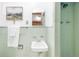 Charming bathroom featuring vintage tiling, classic fixtures, and an airy atmosphere at 2035 Carr St, Lakewood, CO 80214