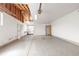 Large, unfinished garage with ample space and potential for customization; perfect for storage or a workshop at 2035 Carr St, Lakewood, CO 80214