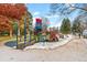 A colorful and fun playground structure in a community space at 2035 Carr St, Lakewood, CO 80214