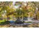 Community playground featuring various play structures and a slide at 2035 Carr St, Lakewood, CO 80214