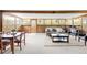 Bright and airy sunroom with wood paneling, comfortable seating, and large windows for abundant natural light at 2035 Carr St, Lakewood, CO 80214