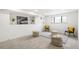 Finished basement offering extra space for relaxing or entertaining, with modern decor at 206 Troy St, Aurora, CO 80011