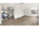 Spacious living room with natural light and views into the kitchen and dining areas at 206 Troy St, Aurora, CO 80011