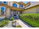 Charming home entrance with a well-manicured lawn and a decorative deer statue for added curb appeal at 11412 W Roxbury Pl, Littleton, CO 80127