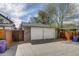 This house includes a detached two-car garage, providing ample space for vehicle storage and extra parking at 4456 Yates St, Denver, CO 80212