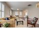 Inviting living room with hardwood floors, plantation shutters, and abundant natural light at 4456 Yates St, Denver, CO 80212