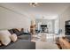Open-concept living area offering ample seating and natural light, perfect for relaxing or entertaining at 4456 Yates St, Denver, CO 80212