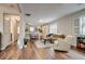 Open concept living area with hardwood floors, a comfortable seating arrangement, and lots of light at 4456 Yates St, Denver, CO 80212