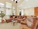Inviting living room with large windows, comfortable seating, and open layout at 11556 W Cooper Pl, Littleton, CO 80127