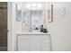 Modern bathroom with a stylish white vanity and decorative accents at 7740 W 35Th Ave # 210, Wheat Ridge, CO 80033