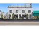 Modern building facade of Stylus & Crate restaurant, with outdoor seating at 7740 W 35Th Ave # 210, Wheat Ridge, CO 80033