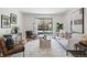 Bright living room featuring modern decor, natural light, and a sliding door at 7740 W 35Th Ave # 210, Wheat Ridge, CO 80033