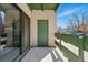 Comfortable patio area leading to a door and large glass window at 7740 W 35Th Ave # 210, Wheat Ridge, CO 80033