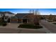 Charming home featuring a spacious three-car garage and well-manicured front yard at 8312 Hackamore Rd, Littleton, CO 80125
