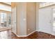Inviting foyer with tile flooring, leading to the main living areas at 8312 Hackamore Rd, Littleton, CO 80125