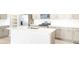 Modern kitchen with stainless steel appliances, a large island, and sleek countertops at 779 N Tempe St, Aurora, CO 80018